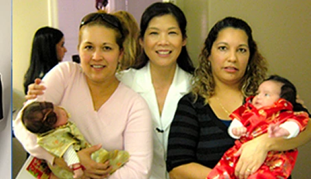 Dr. Liu with Mothers and Babies