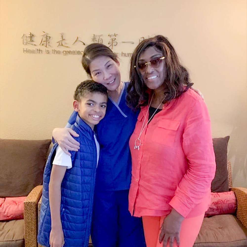 Dr. Liu with Mother and Son