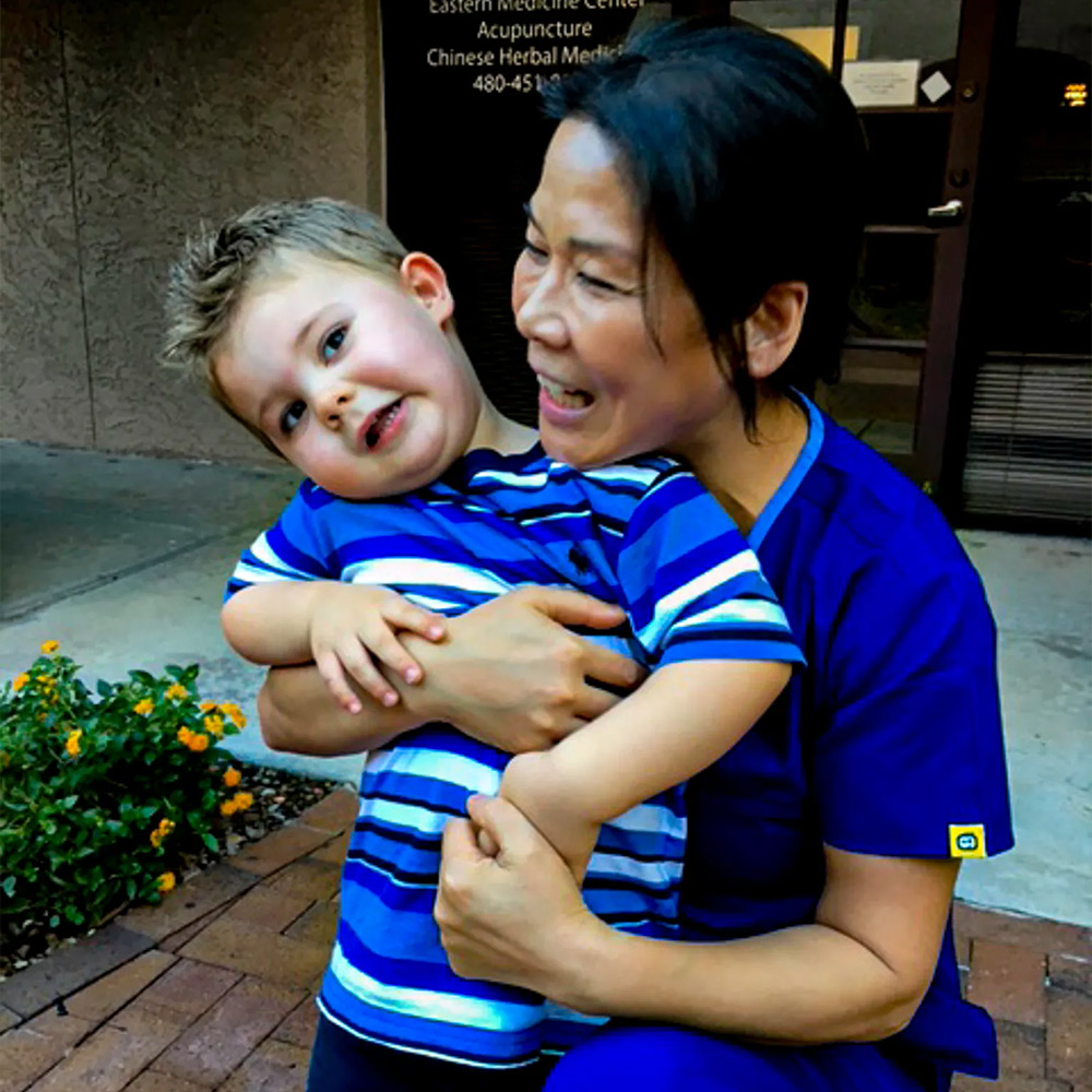 Dr. Liu with Patient