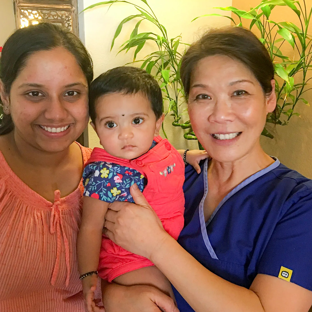 Dr. Liu with Baby