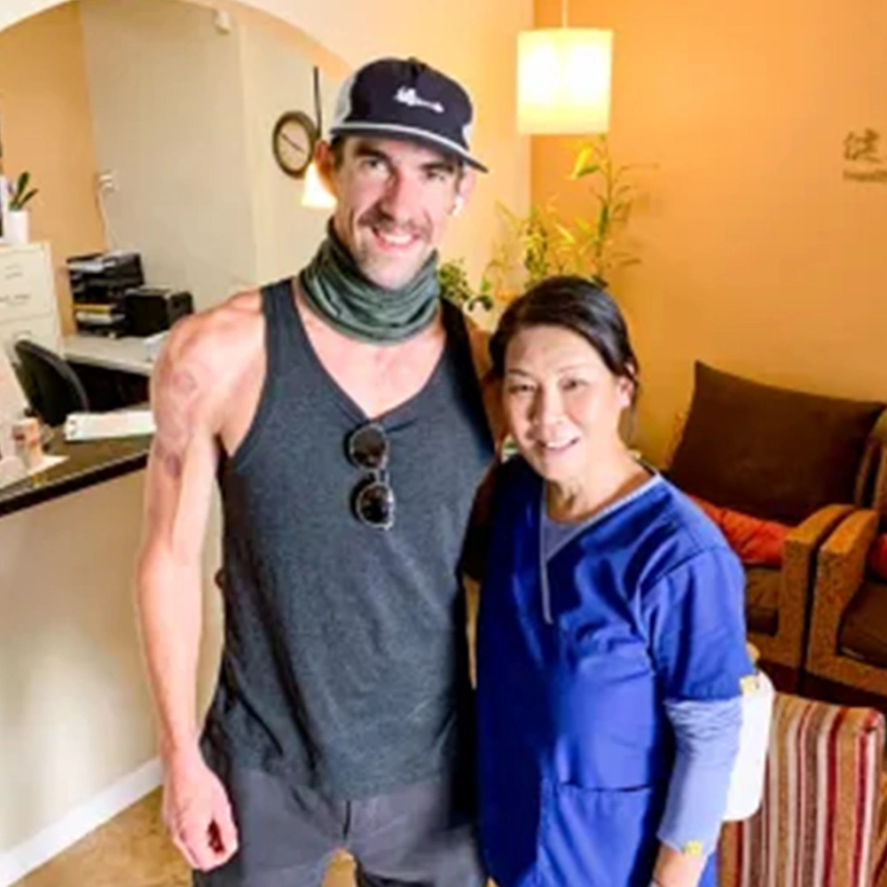 Dr. Liu and Michael Phelps